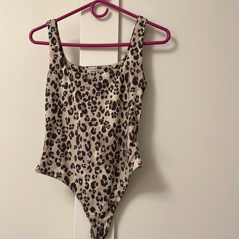 Leopard bodysuit. Size medium. Slightly worn.
